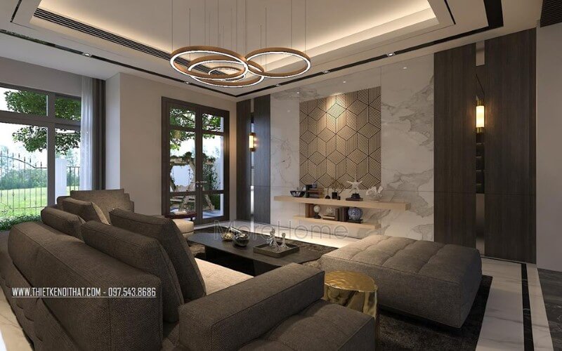 Trang trí không gian phòng khách rộng, hiện đại ấn tượng với ý tưởng sử dụng gam màu đối lập từ xám trắng cùng đồ nội thất cao cấp. Thiết kế phòng khách nhà phố