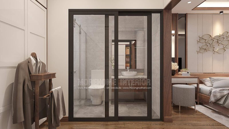 Bạn đang băn khoăn với ý tưởng bố trí phòng ngủ nam khép kín khi sử dụng gỗ óc chó làm vật liệu chủ đạo phòng ngủ thì phòng tắm nên trang trí như nào cho hợp lý mà vẫn giữ nguyên vẻ đẹp sang trọng đó. Ý tưởng trang trí phòng tắm cửa kính trượt viền đen kết hợp không gian màu xám từ gạch ốp giả bê tông cùng tủ đựng đồ phòng tắm bề mặt đá vân mây với lớp cánh gỗ óc chó sẽ là gợi ý khá độc đáo trong căn hộ chung cư, nhà phố, nhà liền kề, biệt thự. Mẫu nội thất biệt thự đẹp