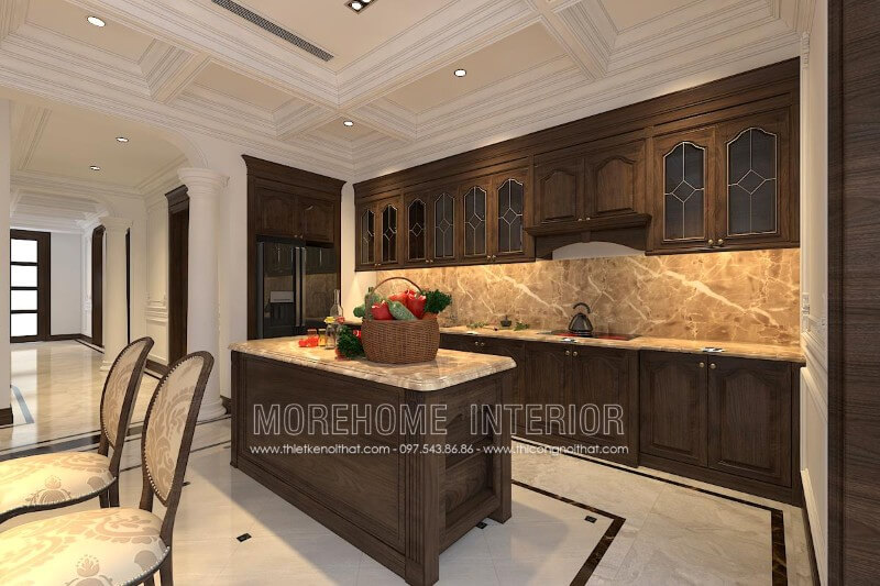 Thiết kế tủ bếp gỗ óc chó tân cổ điển kết hợp bàn đảo cùng chất liệu được đặt chính giữa tạo sự cân bằng cho không gian cũng như tiện nghi hơn cho người nội trợ Tủ bếp đẹp, sang trọng và đẳng cấp