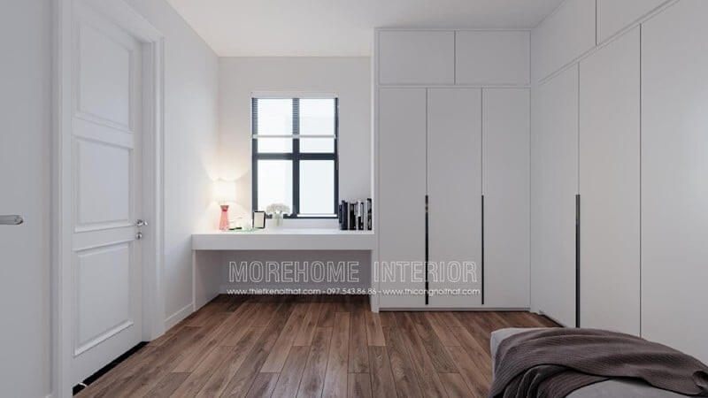 Mẫu tủ quần áo gỗ công nghiệp acrylic màu trắng với kích thước lớn ốp dọc mảng tường giúp tiết kiệm diện tích không gian căn phòng ngủ