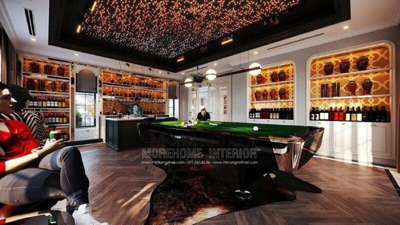 Bàn bi-a, quầy bar, hầm rượu, trần xuyên sáng đã tạo nên nét đẹp sang trọng, đẳng cấp trong thiết kế nội thất phòng giải trí tại biệt thự.